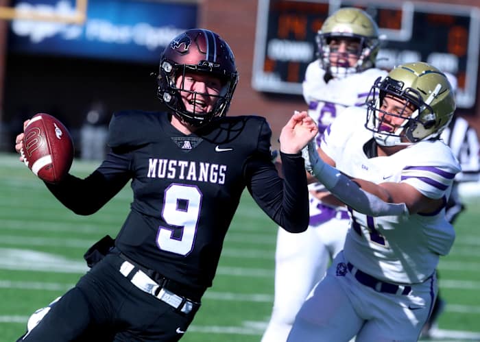 Lipscomb Academy's Hank Brown (9) runs the option as CPA's Crews Law (11) pushes him out of bounds during the BlueCross Bowl Division II-AA Championship game at Finley Stadium, in Chattanooga, Tenn., on Thursday, Dec. 1, 2022. 3 Lipscomb V Cpa Football